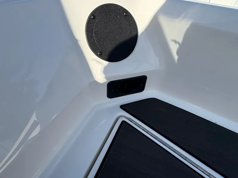 Slide: The Image of 2025 Lund 185 Impact GL boat interior with black and white detailing. - 19