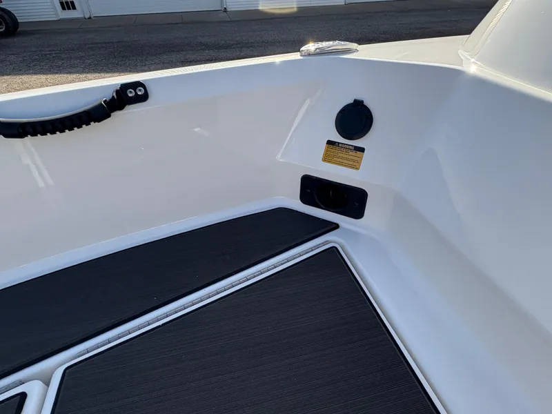 Slide: The Image of 2025 Lund 185 Impact GL boat interior, featuring sleek design and modern fittings. - 20