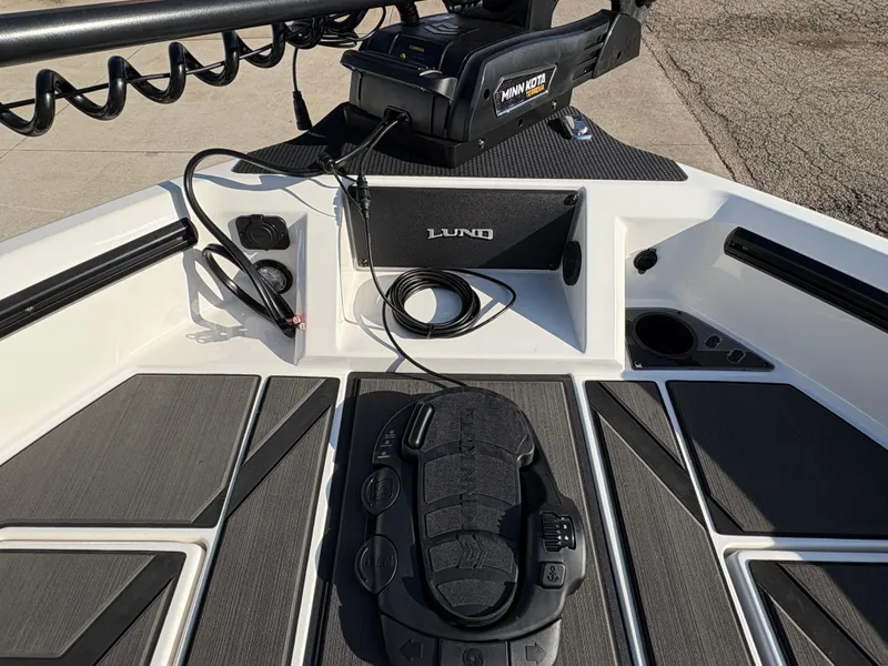Slide: The Image of 2025 Lund 185 Impact GL boat deck with Minn Kota trolling motor. - 21