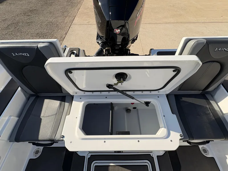 Slide: The Image of 2025 Lund 185 Impact GL boat interior with open storage compartment. - 35