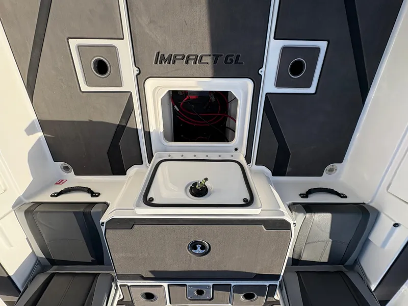 Slide: The Image of 2025 Lund 185 Impact GL boat interior with storage compartments and seating. - 36