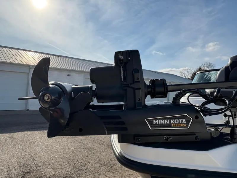 Slide: The Image of Minn Kota Terrova motor on 2025 Lund 185 Impact GL boat, sunny day. - 9