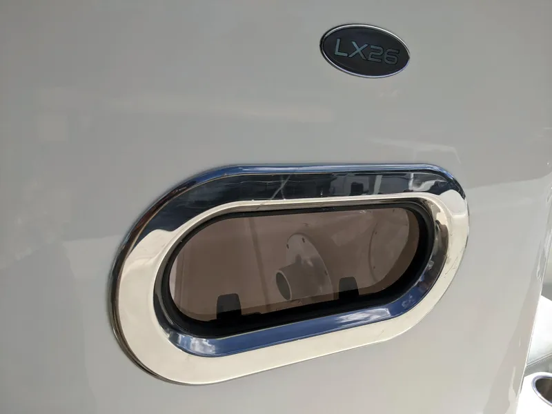 Slide: The Image of Sea Born LX26 2021 boat window with chrome trim. - 19