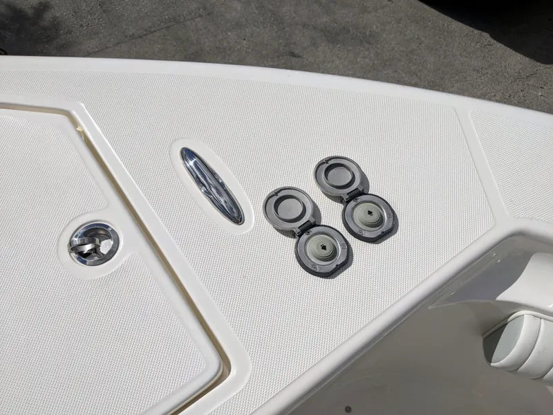 Slide: The Image of 2021 Sea Born LX26 boat deck with open hatches and fittings. - 34