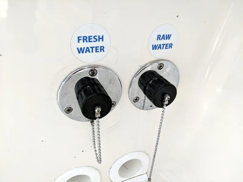 Slide: The Image of Sea Born LX26 2021 boat water outlets labeled fresh and raw water. - 40