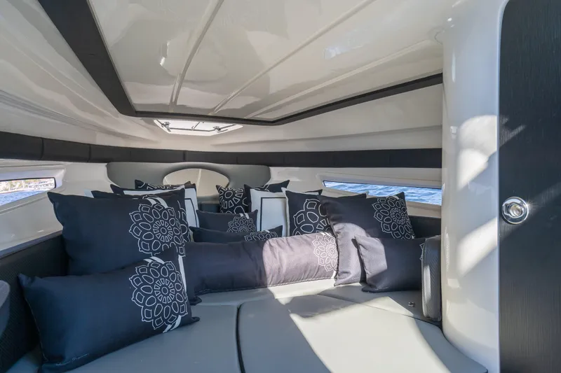 Slide: The Image of Luxurious interior of 2025 Hanover 305 Outboard boat with stylish cushions and modern design. - 13