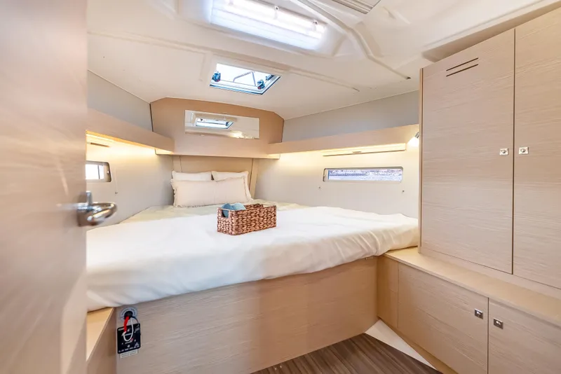 Slide: The Image of Luxurious cabin interior of 2023 Dufour 390 yacht with modern wood finish. - 27