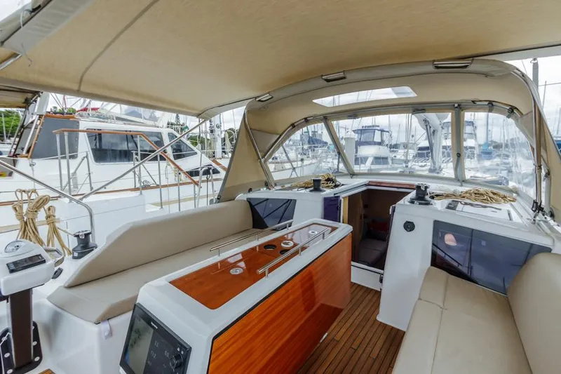 Slide: The Image of Interior view of 2023 Dufour 390 yacht with sleek design and modern amenities. - 9