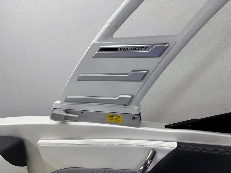 Slide: The Image of 2025 Chaparral 21 Surf boat interior with Velocity branding and sleek design. - 26