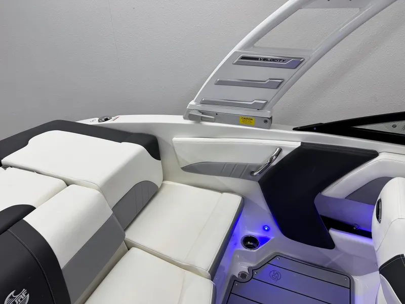 Slide: The Image of 2025 Chaparral 21 Surf boat interior with sleek seating and modern design. - 27