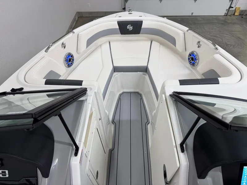 Slide: The Image of 2025 Chaparral 21 Surf boat interior with sleek seating and modern design. - 28