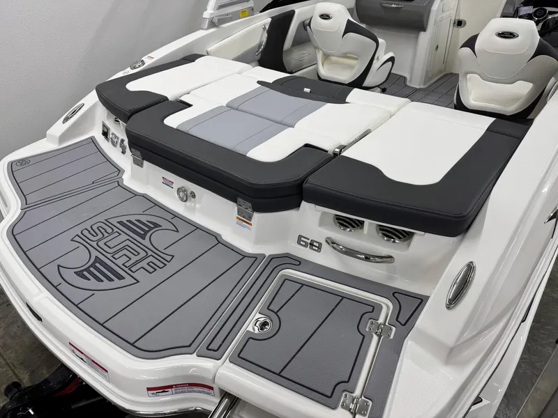 Slide: The Image of 2025 Chaparral 21 Surf boat interior with sleek seating and stylish design. - 5