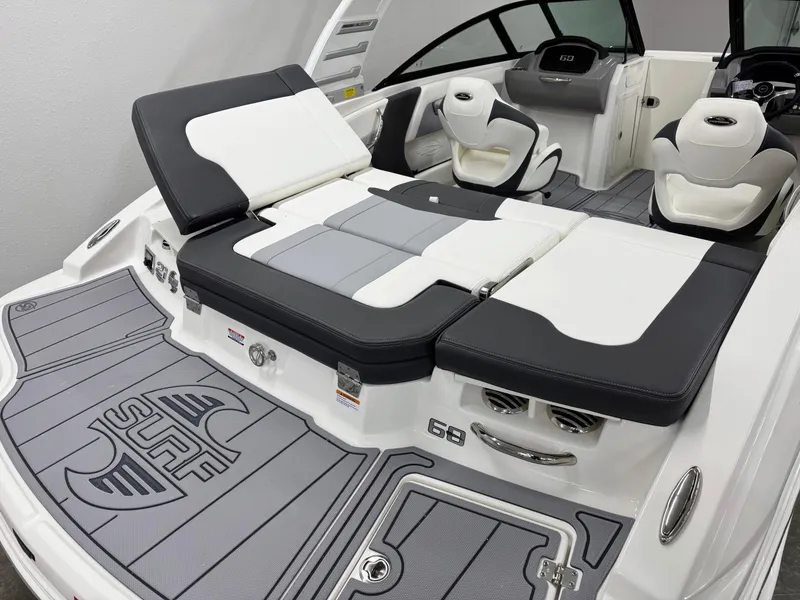 Slide: The Image of 2025 Chaparral 21 Surf boat interior with sleek seating and modern design. - 8