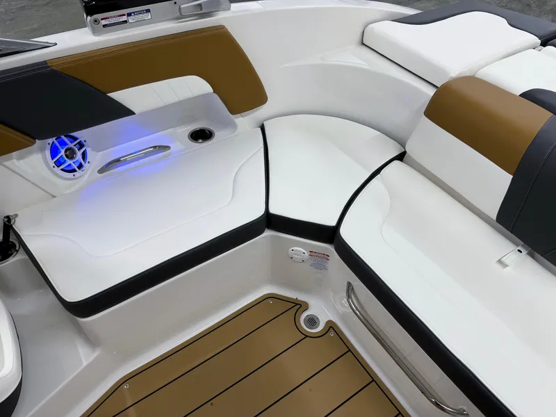 Slide: The Image of 2025 Chaparral 23 SSi boat interior with stylish seating and modern design. - 17