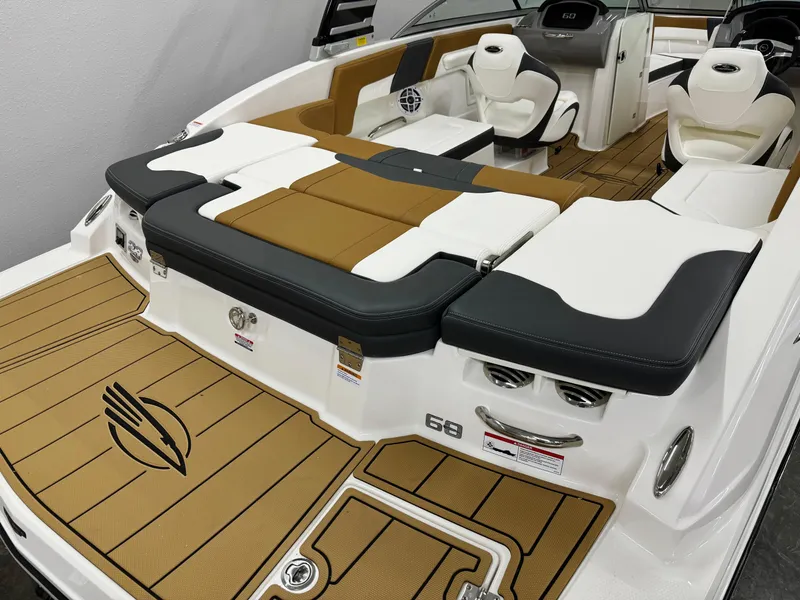 Slide: The Image of 2025 Chaparral 23 SSi boat interior with luxurious seating and modern design. - 4
