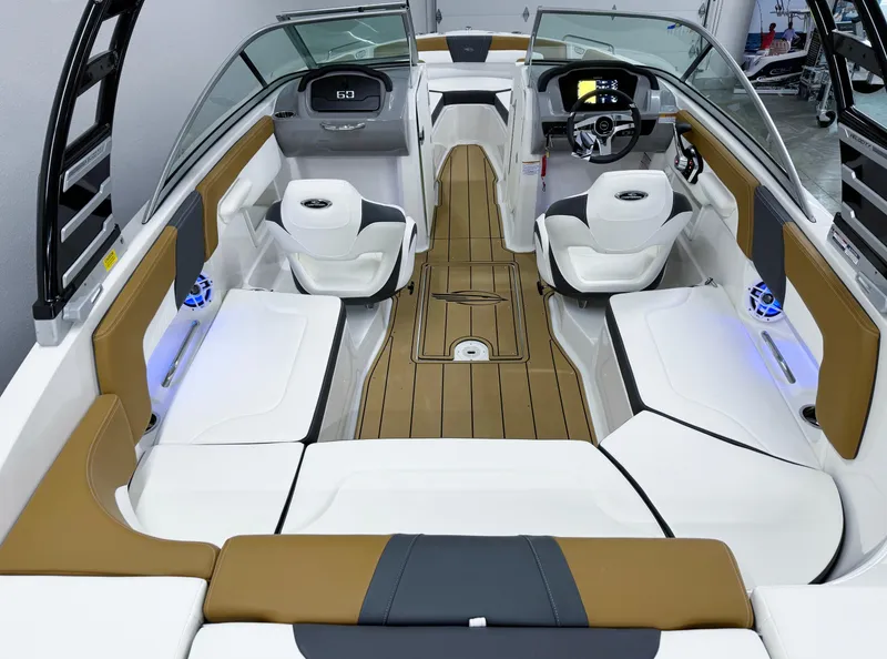 Slide: The Image of 2025 Chaparral 23 SSi boat interior with modern seating and sleek design. - 8