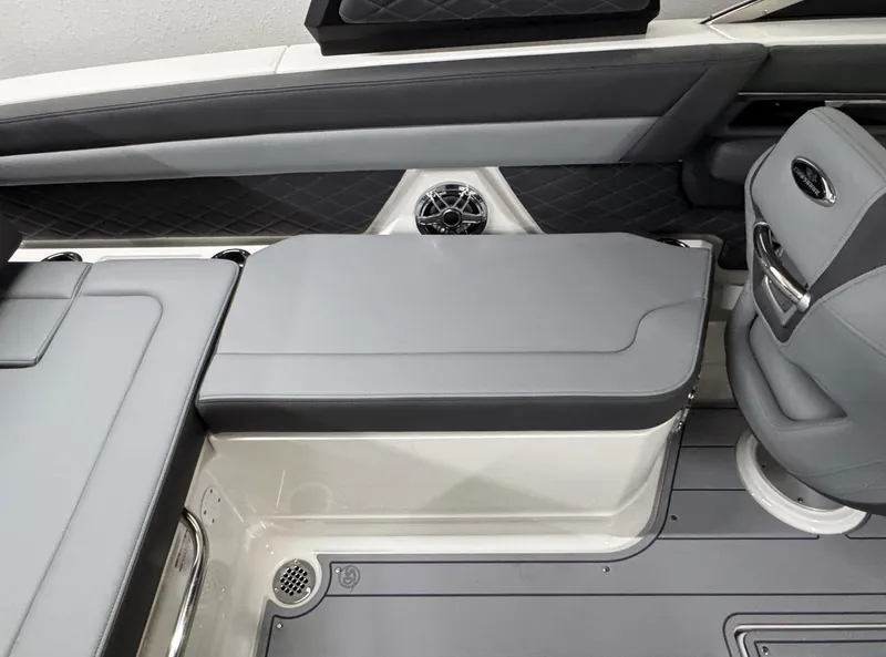 Slide: The Image of 2025 Chaparral 26 Surf boat interior with sleek seating and modern design. - 22