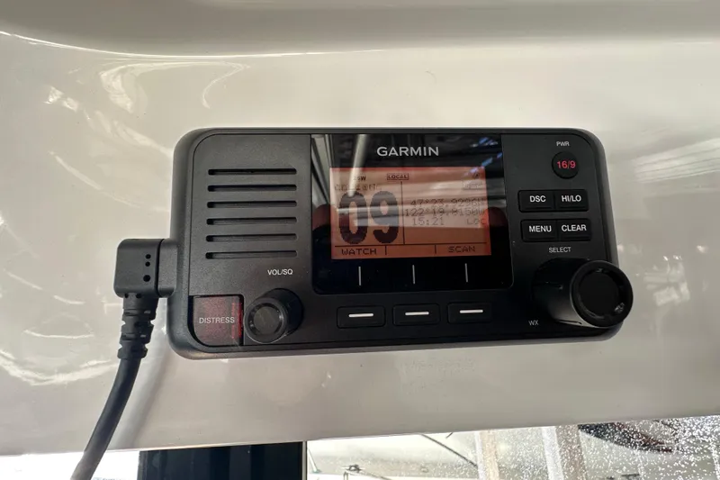 Slide: The Image of Garmin marine radio on 2021 Jeanneau NC 895 boat dashboard. - 19