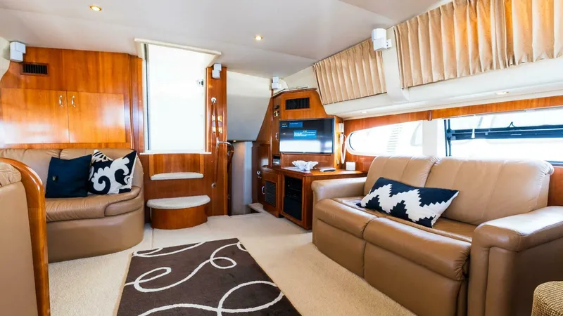 Slide: The Image of Luxurious interior of 2004 Carver 466 Motor Yacht with leather seating and modern decor. - 14