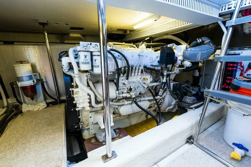 Slide: The Image of Engine room of a 2004 Carver 466 Motor Yacht, showcasing detailed machinery and components. - 29