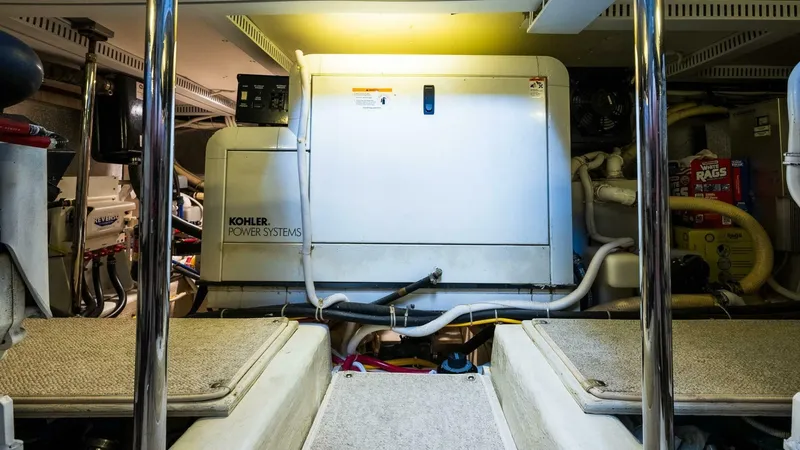 Slide: The Image of Engine room of 2004 Carver 466 Motor Yacht with Kohler power system. - 32