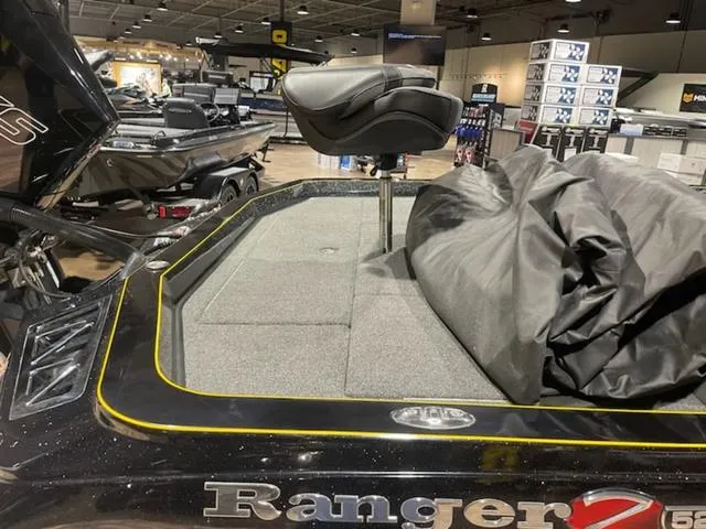 Slide: The Image of 2020 Ranger Z520L RANGER CUP boat interior with seat and cover in showroom. - 6