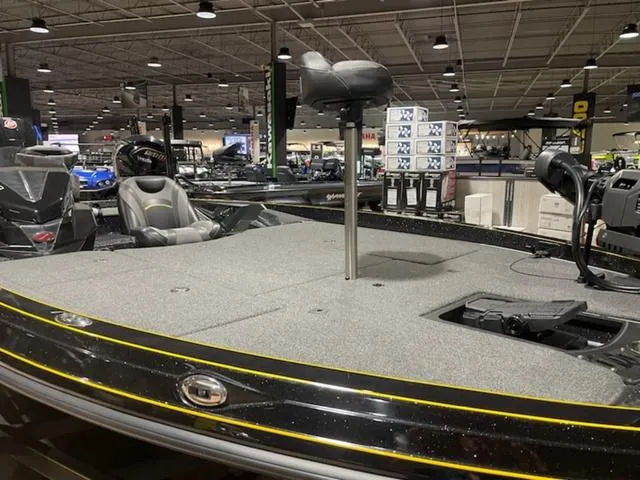 Slide: The Image of 2020 Ranger Z520L RANGER CUP EQUIPPED boat interior at a showroom. - 8