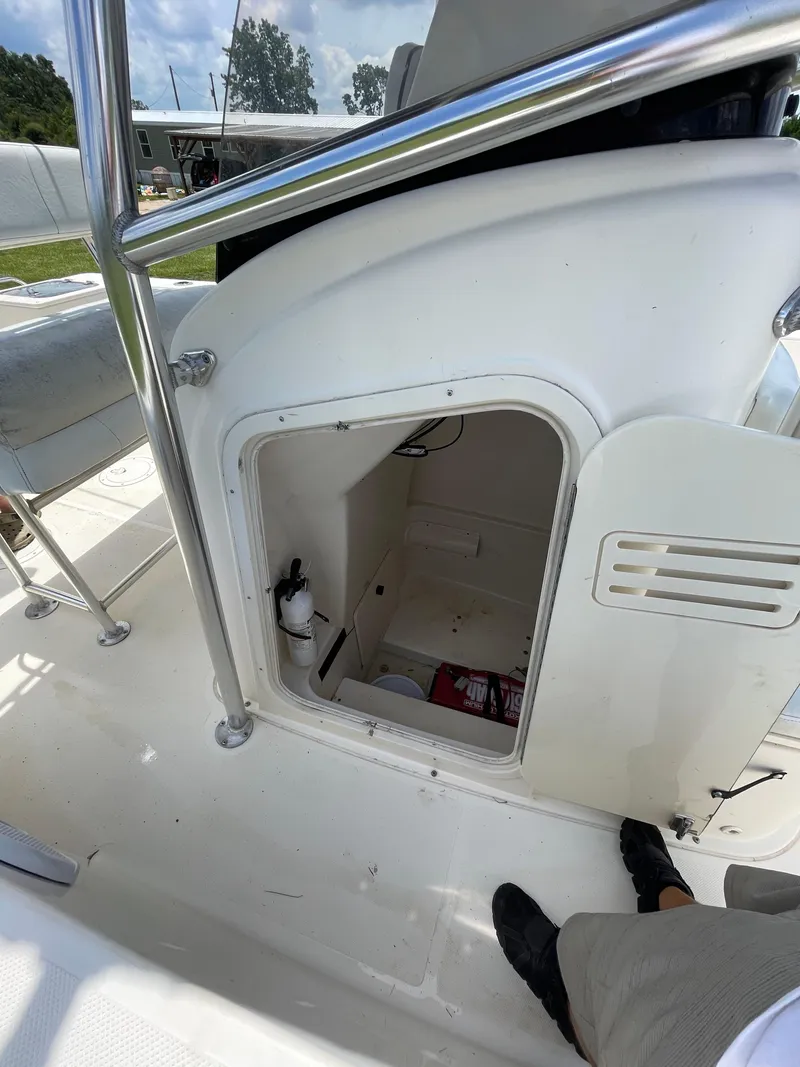 Slide: The Image of 2008 Pursuit 230 Center Console boat interior storage compartment. - 20