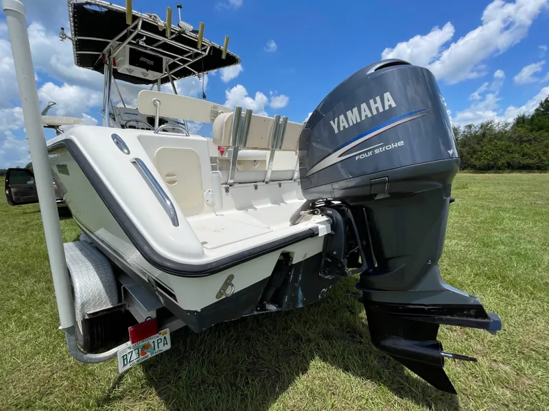 Slide: The Image of 2008 Pursuit 230 Center Console boat with Yamaha outboard engine on trailer. - 4