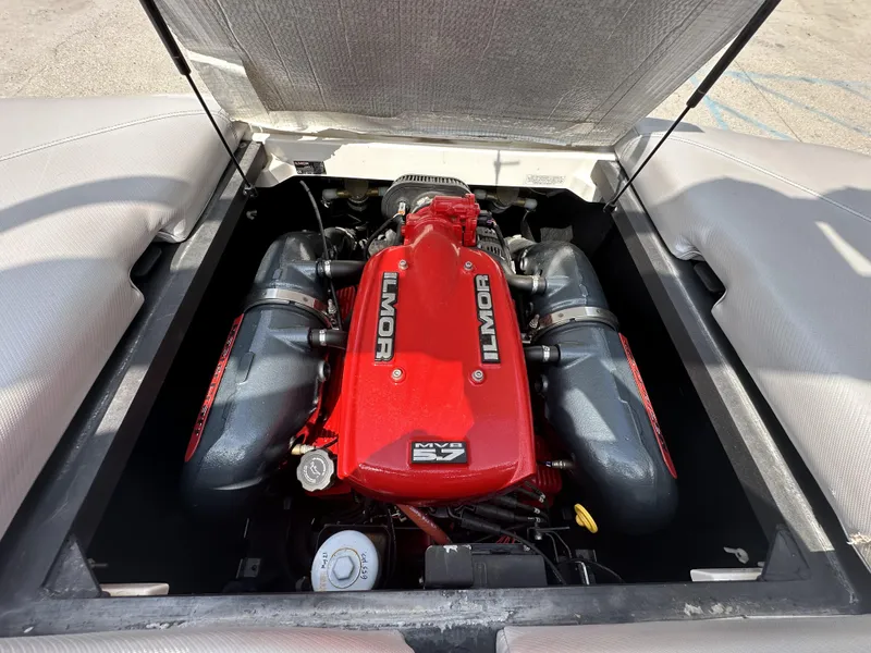 Slide: The Image of 2014 MasterCraft X2 boat engine, Ilmor MV8 5.7, red and black components. - 19