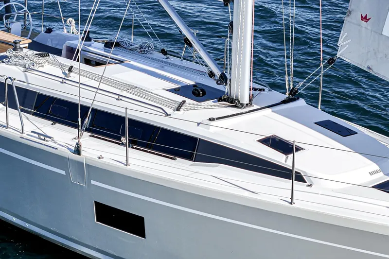 Slide: The Image of 2024 Bavaria C38 sailboat on water, showcasing sleek design and modern features. - 22