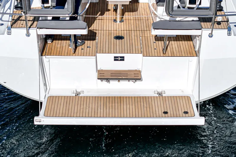 Slide: The Image of 2024 Bavaria C38 yacht stern with teak deck and swim platform. - 30