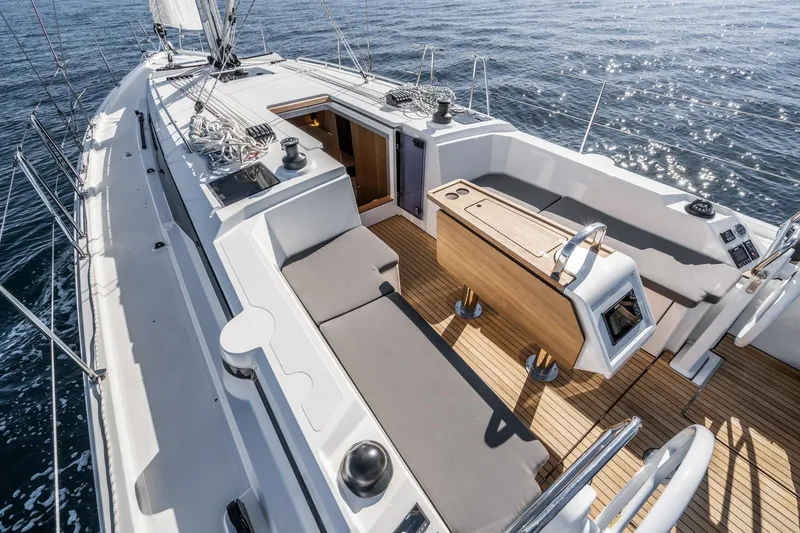 Slide: The Image of 2024 Bavaria C38 yacht deck with modern seating and ocean view. - 32