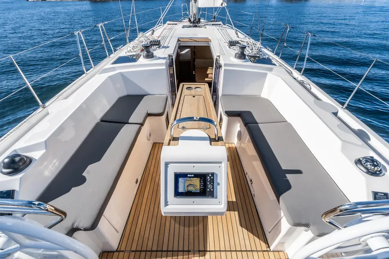 Slide: The Image of 2024 Bavaria C38 yacht cockpit with modern navigation system and spacious seating. - 35