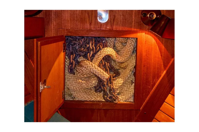 Slide: The Image of Anchor chain and rope storage in 1983 Valiant 40 Selah sailboat. - 31
