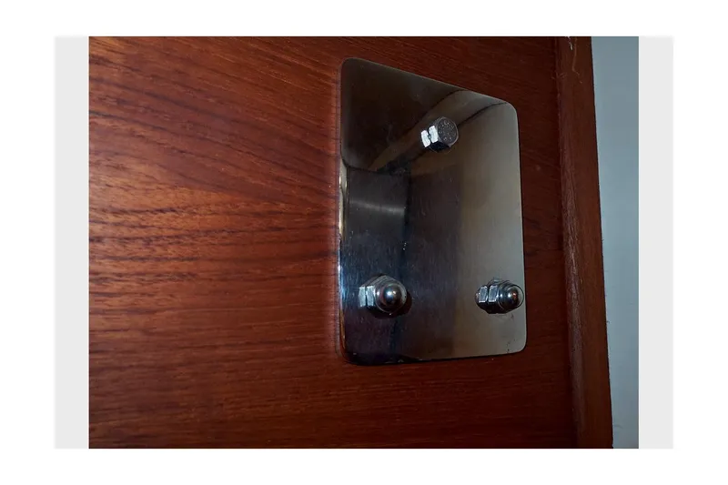 Slide: The Image of Metal plate with bolts on wooden surface, Valiant 40 Selah, 1983. - 32