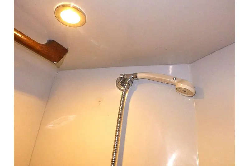 Slide: The Image of Shower area in 1983 Valiant 40 Selah yacht with overhead light. - 42