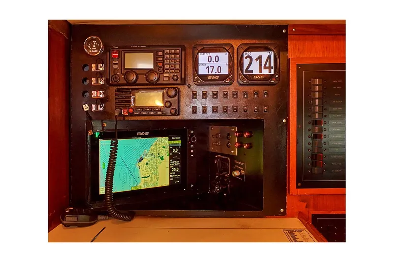 Slide: The Image of Navigation panel of 1983 Valiant 40 Selah yacht with electronic displays and controls. - 46