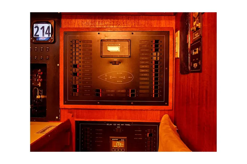 Slide: The Image of Electrical panel inside 1983 Valiant 40 Selah yacht, featuring control switches and gauges. - 47