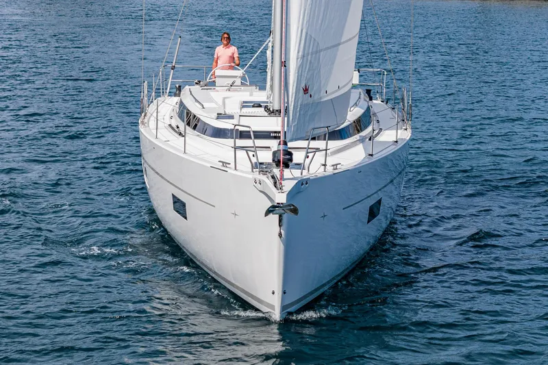Slide: The Image of 2024 Bavaria C50 yacht sailing on open water, front view. - 11