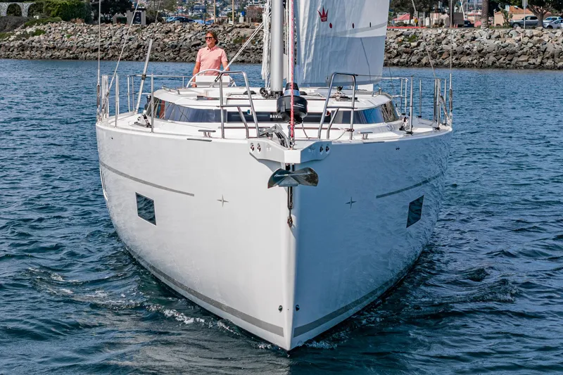 Slide: The Image of 2024 Bavaria C50 yacht sailing on calm waters, front view. - 12