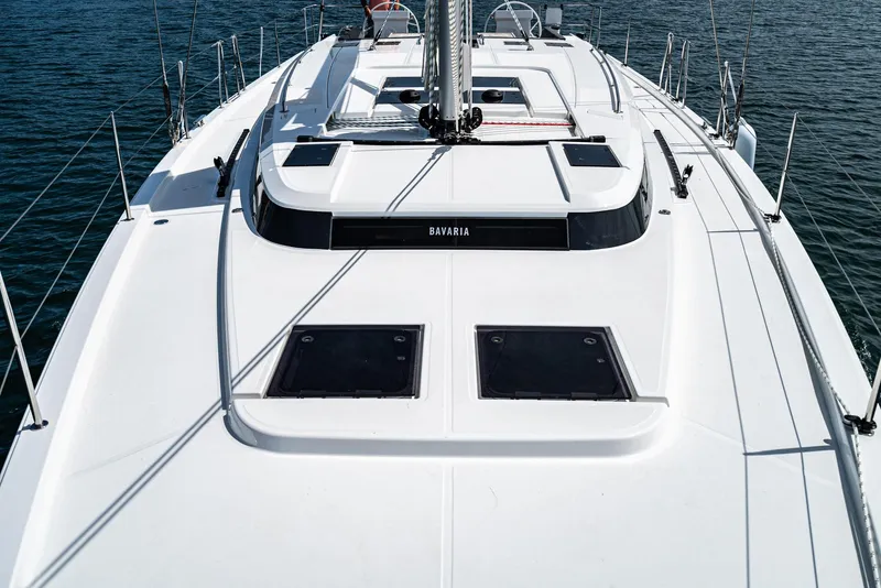 Slide: The Image of 2024 Bavaria C50 yacht deck, sleek design, open sea view. - 19