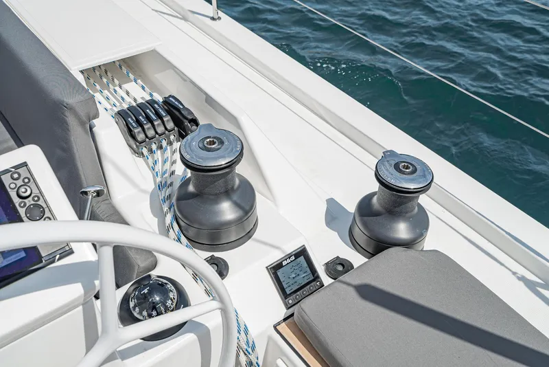 Slide: The Image of 2024 Bavaria C50 yacht deck with winches and navigation equipment. - 38