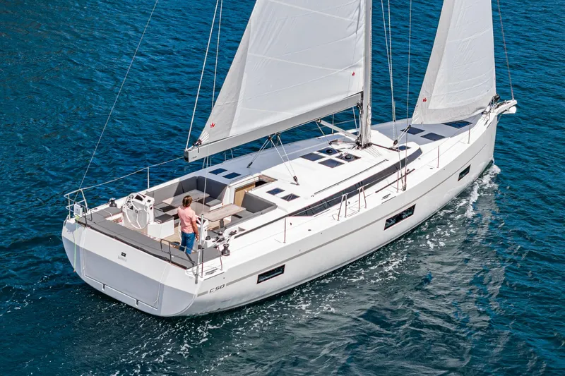 Slide: The Image of 2024 Bavaria C50 sailing yacht cruising on open water. - 4