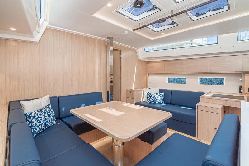 Slide: The Image of Luxurious interior of 2024 Bavaria C50 yacht with modern seating and skylights. - 49
