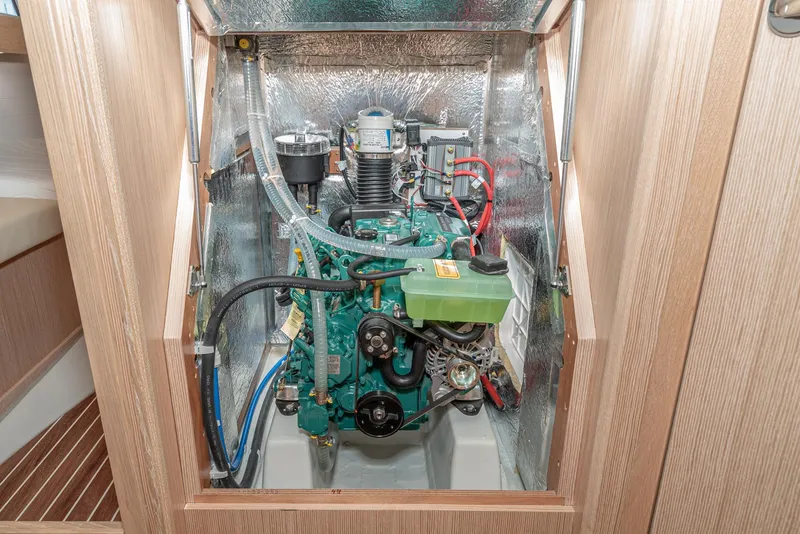 Slide: The Image of 2024 Bavaria Cruiser 34 engine compartment with modern marine engine. - 45