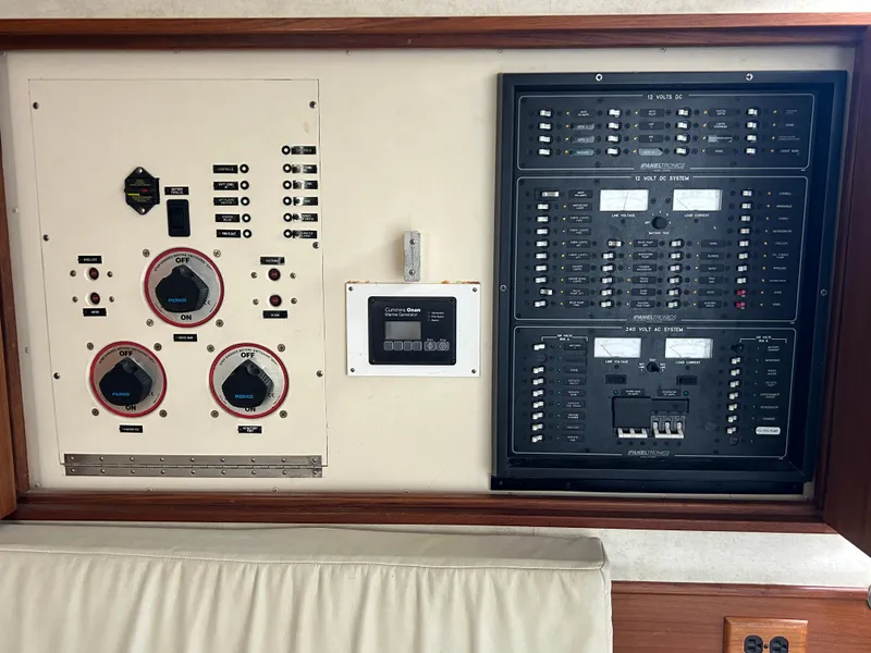 Slide: The Image of Electrical control panel on a 2002 Albemarle 410 Express Fisherman boat. - 23