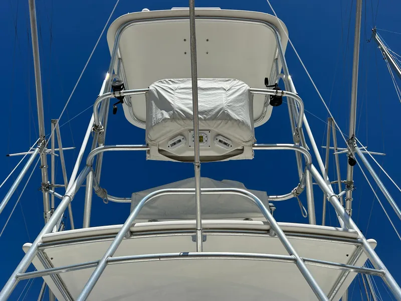 Slide: The Image of Albemarle 410 Express Fisherman 2002, view of tower structure against clear blue sky. - 40