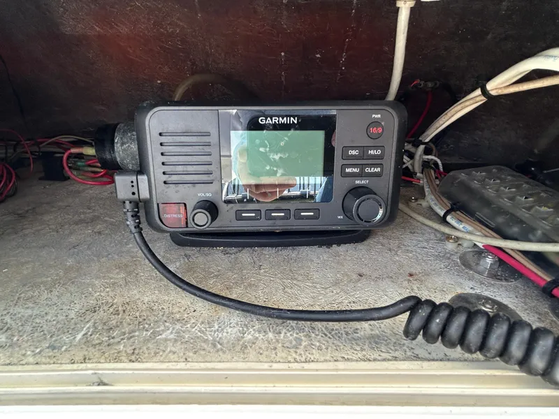 Slide: The Image of Garmin marine radio inside a 2002 Albemarle 410 Express Fisherman boat. - 45