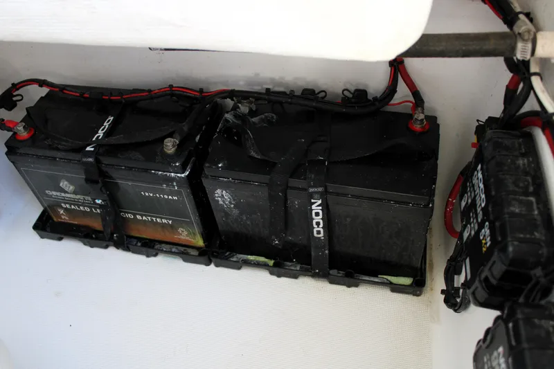 Slide: The Image of 2020 Release 240 RX boat batteries with wiring and connectors. - 18